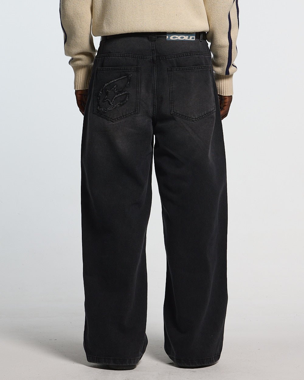 C V2 DIRTY PANTS BLACK - washed black baggy pants, back view on male model - Cold Culture