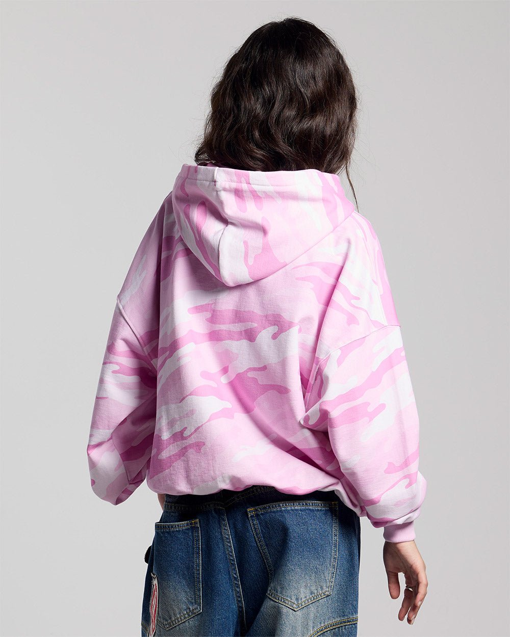 CAMO ZIP HOODIE PINK - pink camo zip-up hoodie, back view on female model - Cold Culture #woman