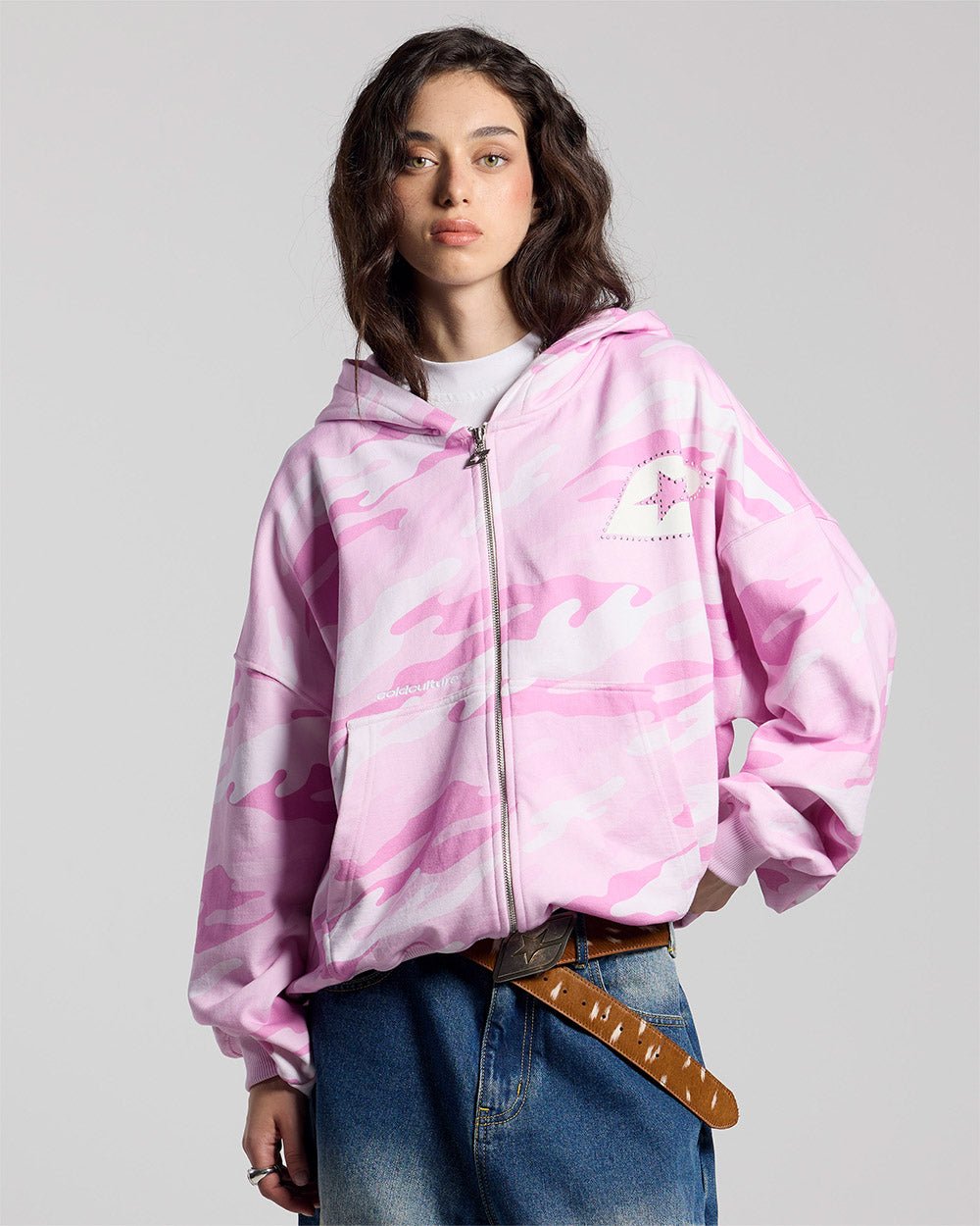 CAMO ZIP HOODIE PINK - pink camo zip-up hoodie, front view on female model - Cold Culture #woman
