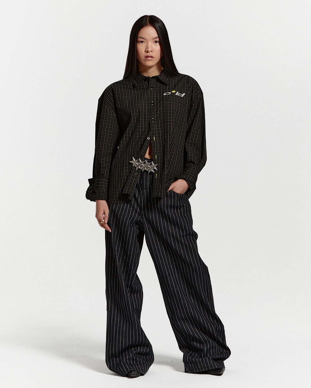 CASINO PANTS BLACK DENIM - black pinstripe denim pants, front view on female model - Cold Culture #woman