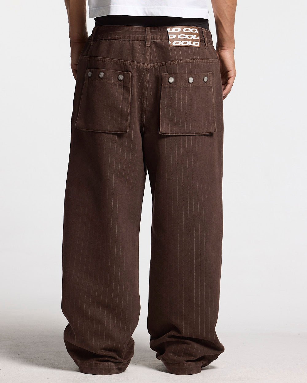 CASINO PANTS BROWN DENIM - brown pinstripe denim pants, back view on male model - Cold Culture