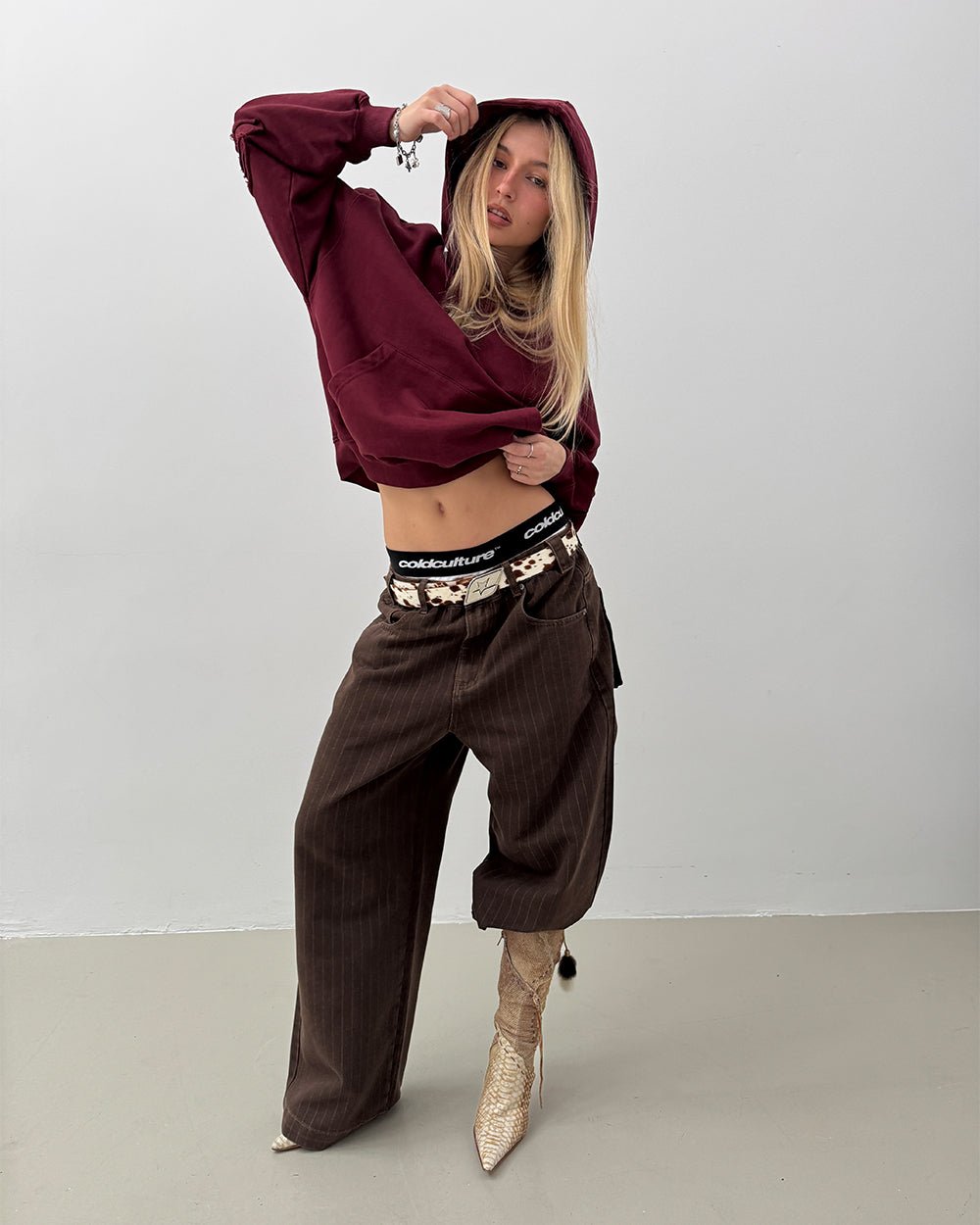 CASINO PANTS BROWN DENIM - brown pinstripe denim pants, front view on female model - Cold Culture #woman