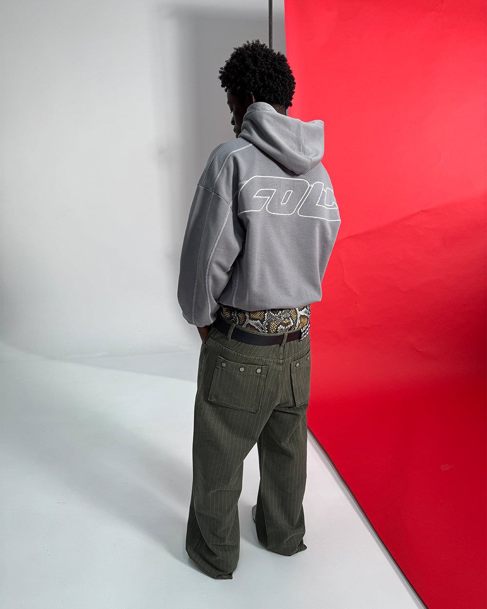 CASINO PANTS GREEN DENIM - green pinstripe denim pants, back view on male model - Cold Culture