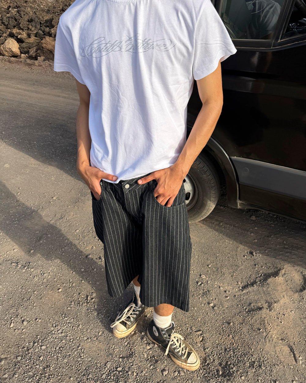 CASINO SHORT BLACK - black pinstripe shorts, street style shot - Cold Culture