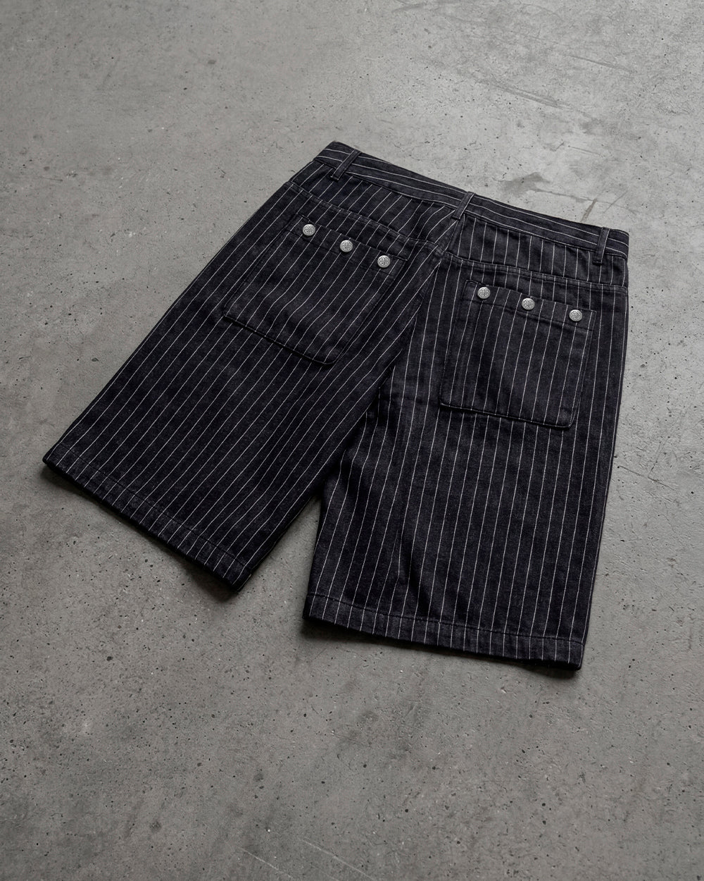 CASINO SHORT BLACK - black pinstripe shorts, flat lay - Cold Culture
