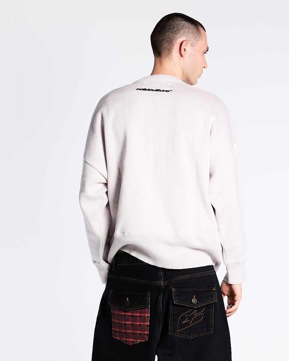 CHAMPIONS CLUB KNIT LIGHT GREY - light grey graphic knit sweater, back view on male model - Cold Culture #man