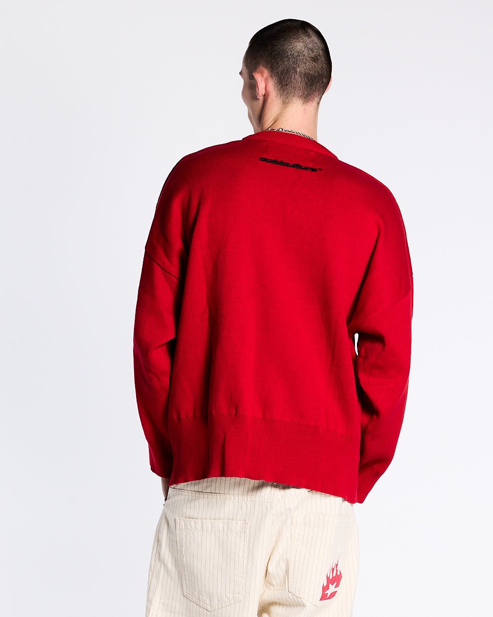 CHAMPIONS CLUB KNIT VIVID RED - red graphic knit sweater, back view on male model - Cold Culture #man