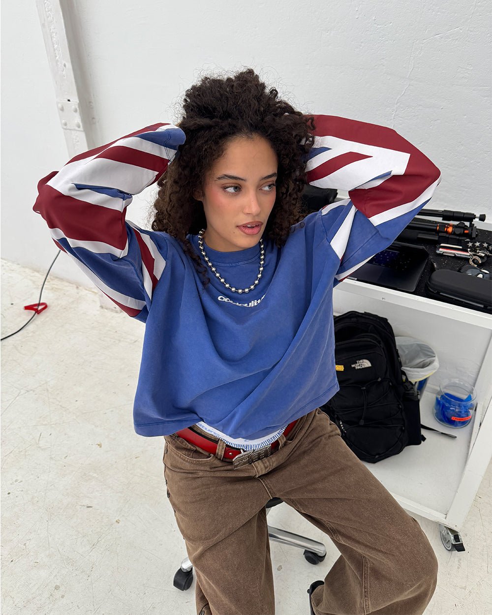 CHEERS LONGSLEEVE ROYAL - royal blue flag print longsleeve tee, street style shot - Cold Culture #woman