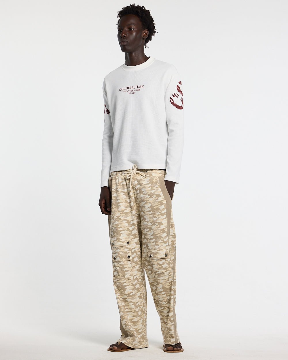 CIPHER LONGSLEEVE OFF-WHITE - off-white graphic print longsleeve tee, front view on male model - Cold Culture #man