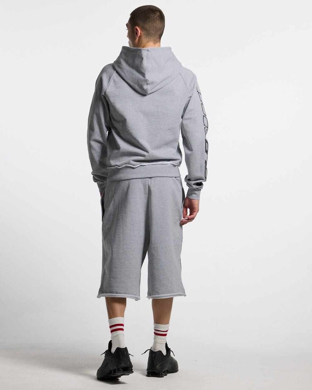 COLD SPORT ZIP HOODIE GREY - grey zip-up hoodie, back view on male model - Cold Culture