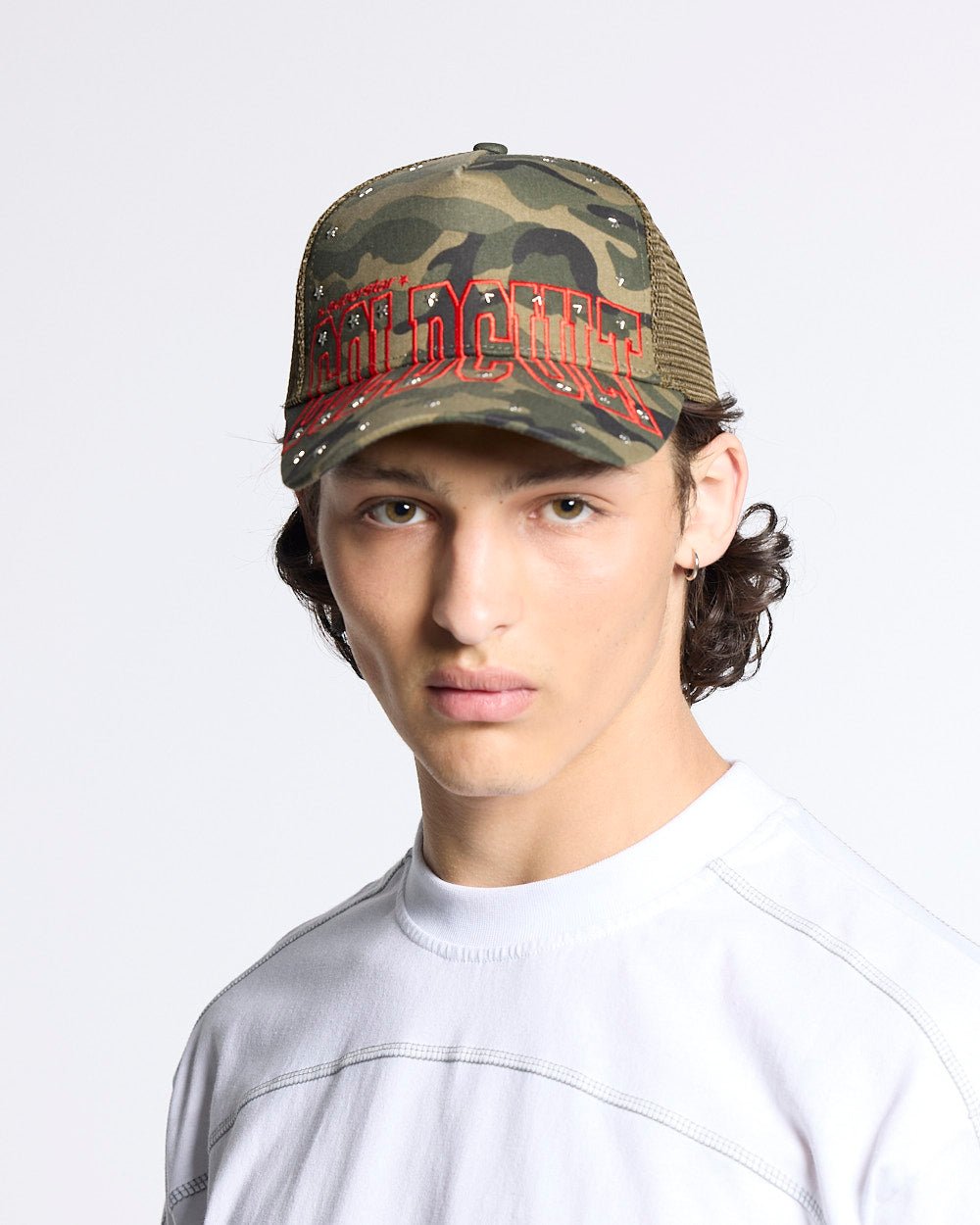 COLDCULT CAP GREEN - green camo trucker cap, front view on male model - Cold Culture #man