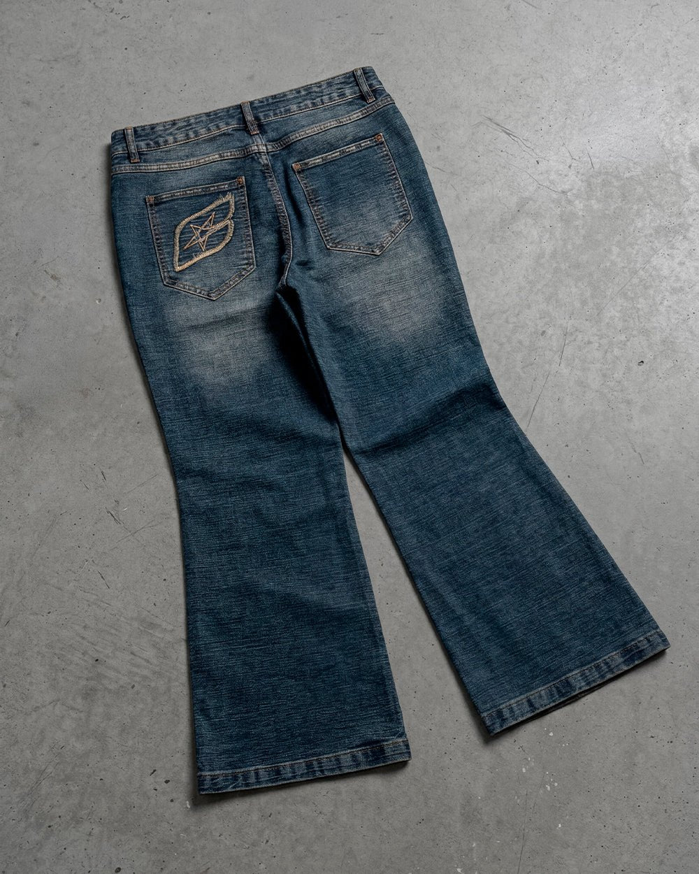 CONCRETE BOOTCUT JEANS BLUE - washed blue bootcut jeans, flat lay - Cold Culture