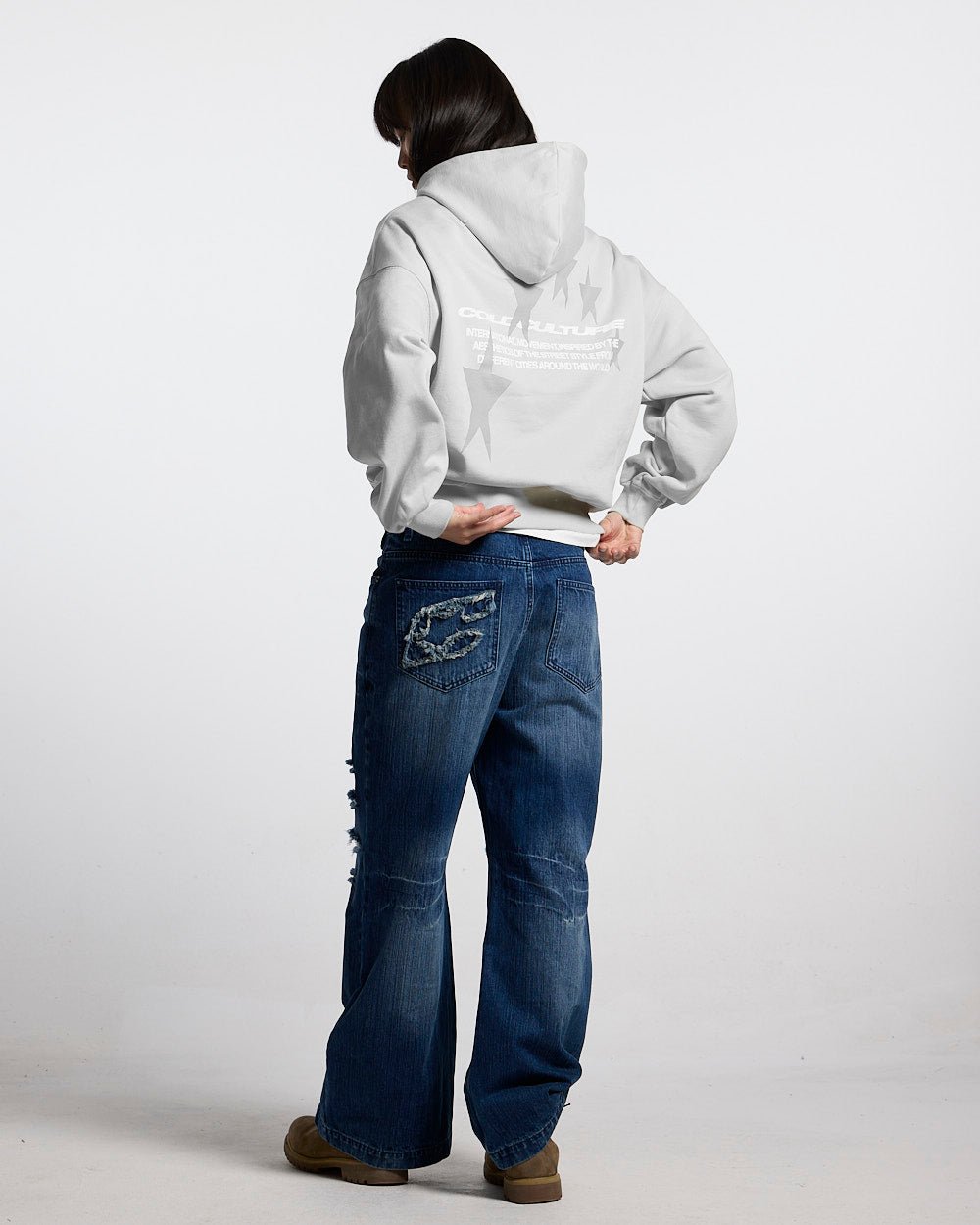 COSMOS ARC HOODIE LIGHT GREY - light grey oversized hoodie, back view on female model - Cold Culture #woman