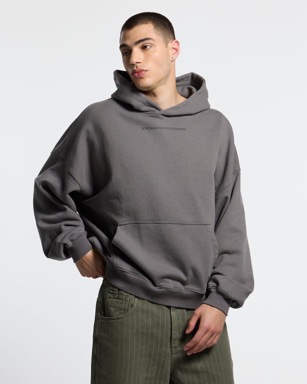 COSMOS ARC HOODIE SMOKEY GREY - grey star print hoodie, front view on male model - Cold Culture #man