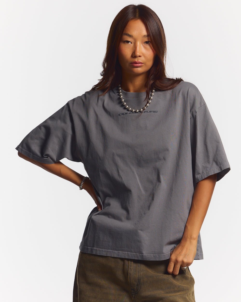 COSMOS ARC TEE SMOKEY GREY - washed grey oversized tee, front view on female model - Cold Culture #woman