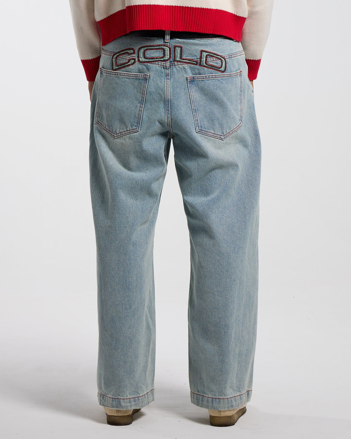 COWBOY V1 PANTS BLUE DENIM - light blue baggy denim pants, back view on male model - Cold Culture