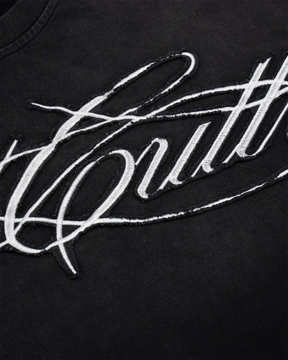 CROSSED SCRIPT LONGSLEEVE 2.0 BLACK - black script print longsleeve tee, detail close-up - Cold Culture