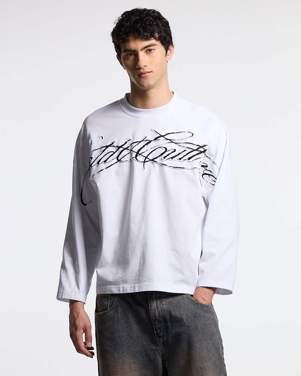 CROSSED SCRIPT LONGSLEEVE 2.0 WHITE - white script print longsleeve tee, front view on male model - Cold Culture #man