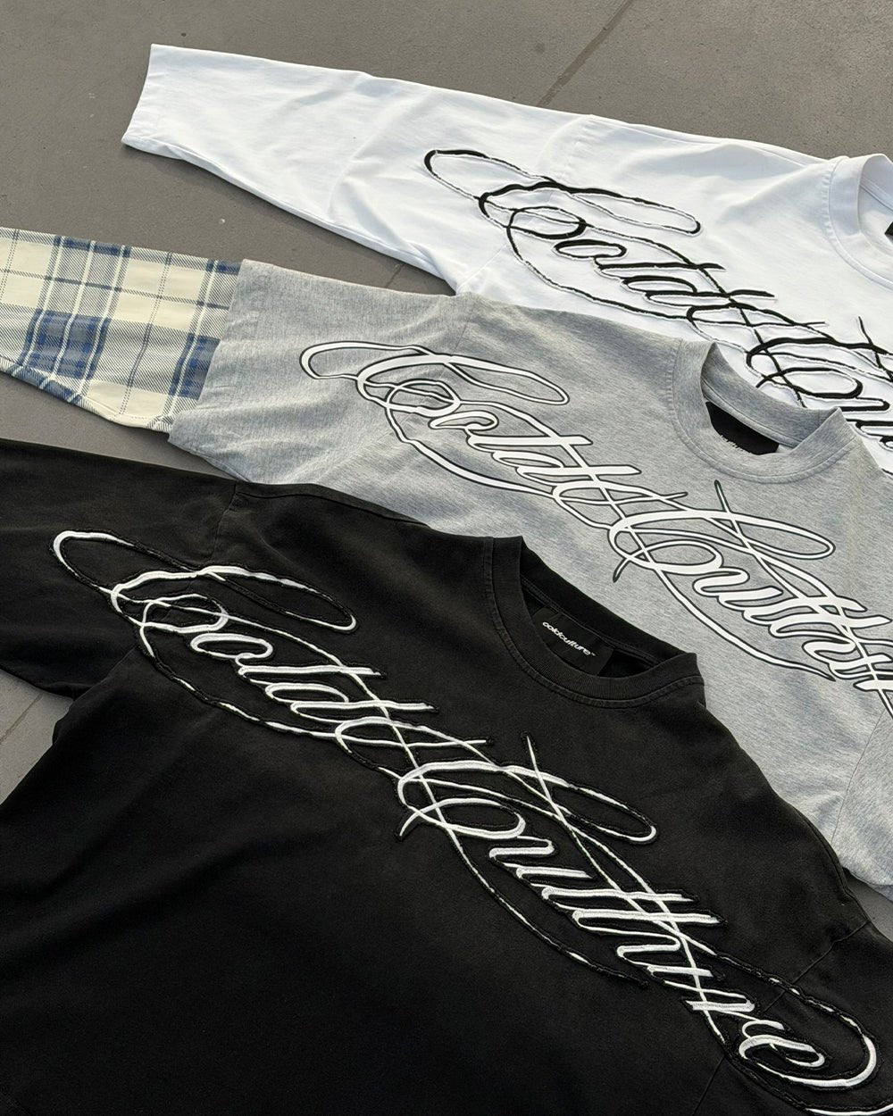 CROSSED SCRIPT LONGSLEEVE 2.0 WHITE - white script print longsleeve tee, flat lay with matching pieces - Cold Culture