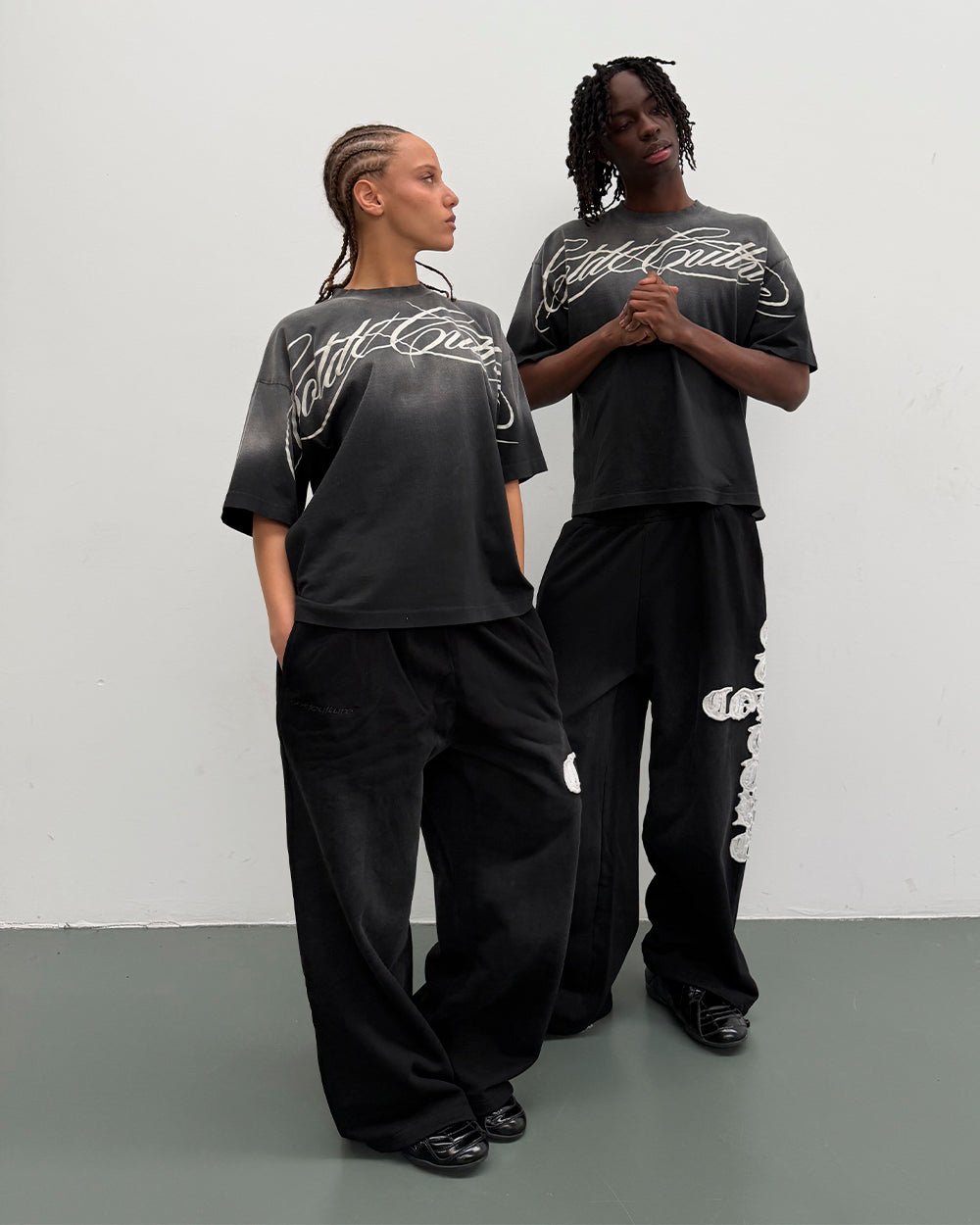 CROSSED SCRIPT TEE BLACK - washed black tee, street style shot - Cold Culture