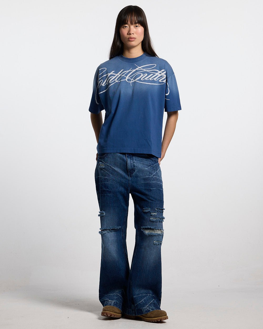 CROSSED SCRIPT TEE BLUE - washed blue tee, front view on female model - Cold Culture #woman
