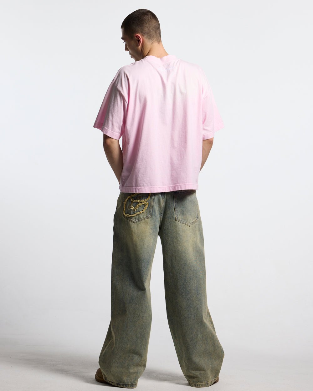 CROSSED SCRIPT TEE PINK - washed pink tee, back view on male model - Cold Culture #man