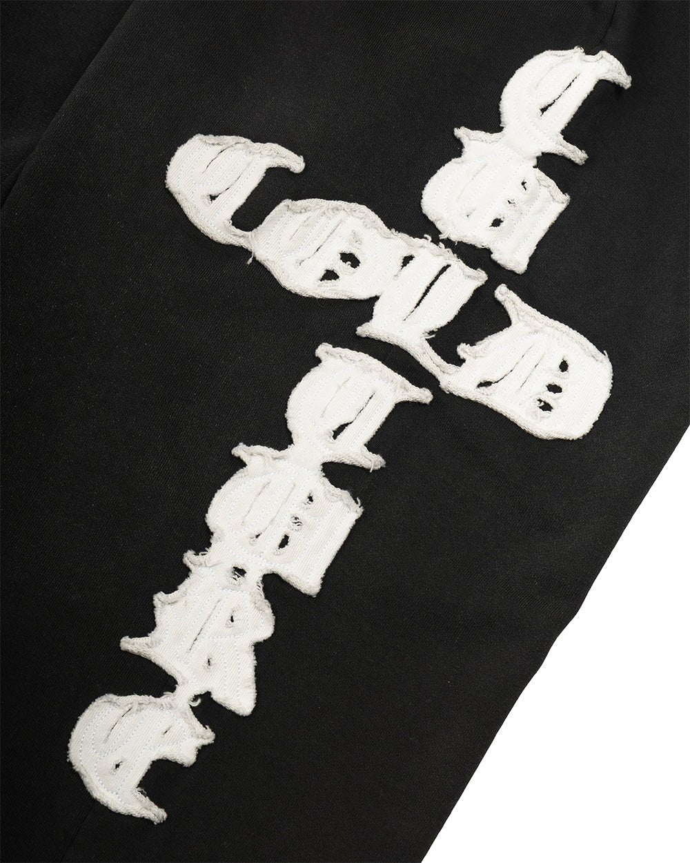 CROSSED SWEATPANTS BLACK - black baggy sweatpants, detail close-up - Cold Culture