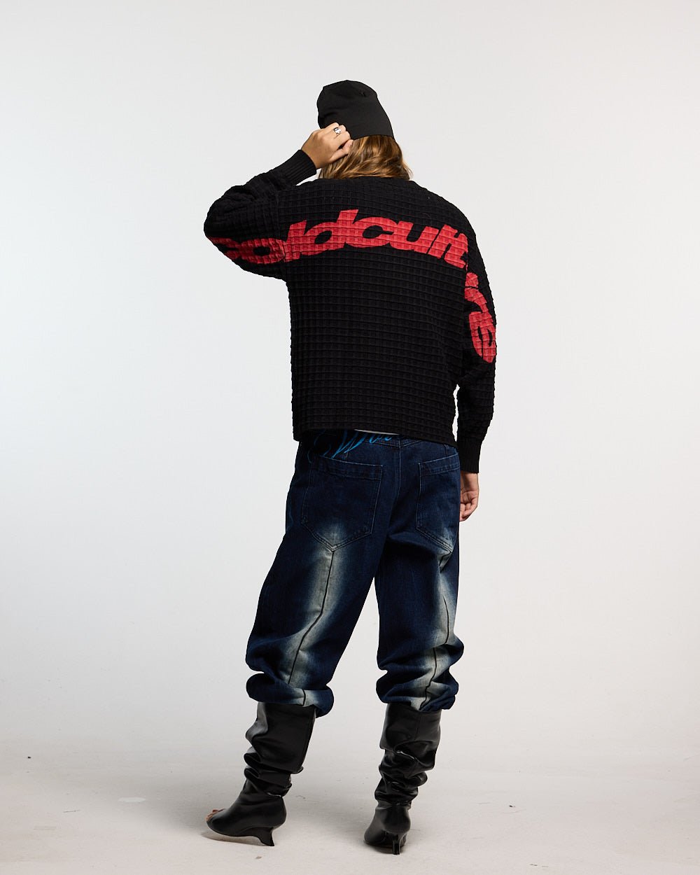 CRUNCHY WAFFLE KNIT BLACK - black waffle knit sweater, back view on female model - Cold Culture #woman