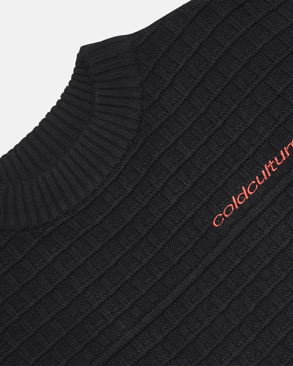 CRUNCHY WAFFLE KNIT BLACK - black waffle knit sweater, detail close-up - Cold Culture