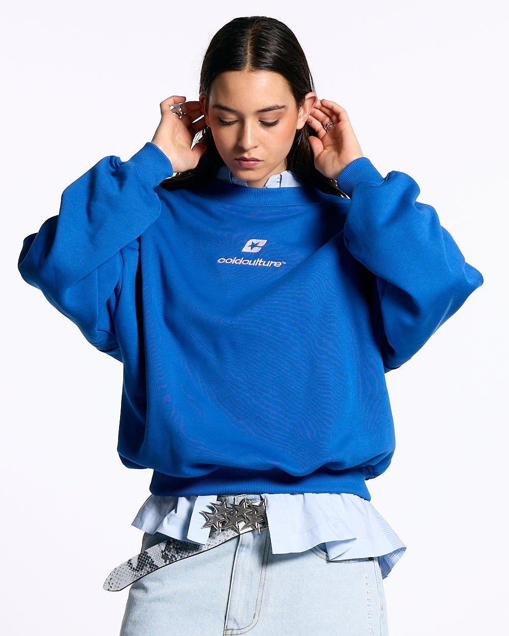 CURVED CREWNECK BLUE - blue oversized crewneck sweatshirt, front view on female model - Cold Culture #woman