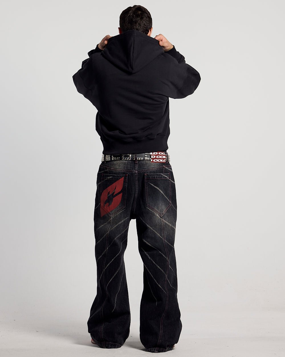 CURVED FRONT HOODIE BLACK - black graphic print hoodie, back view on male model - Cold Culture
