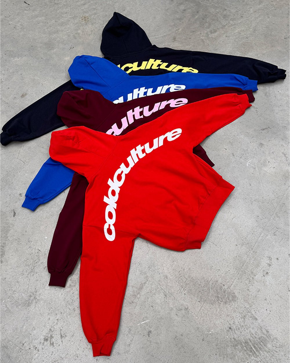 CURVED HOODIE BLUE - royal blue logo print hoodie, flat lay with matching pieces - Cold Culture