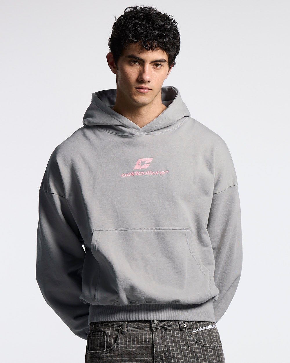 CURVED HOODIE GREY - grey logo print hoodie, front view on male model - Cold Culture #man