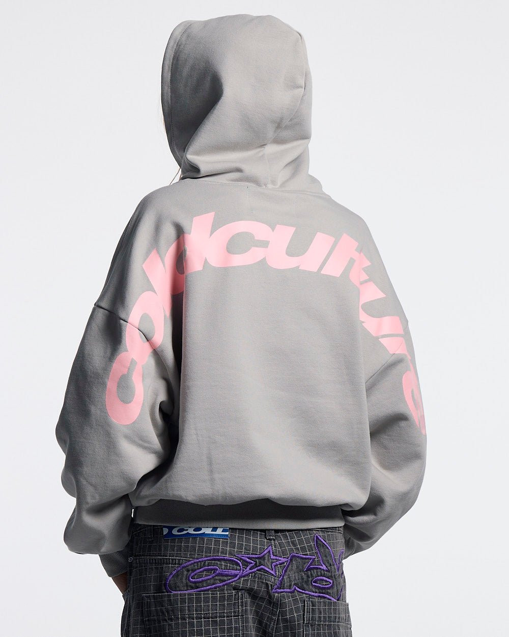 CURVED HOODIE GREY - grey logo print hoodie, back view on female model - Cold Culture #woman