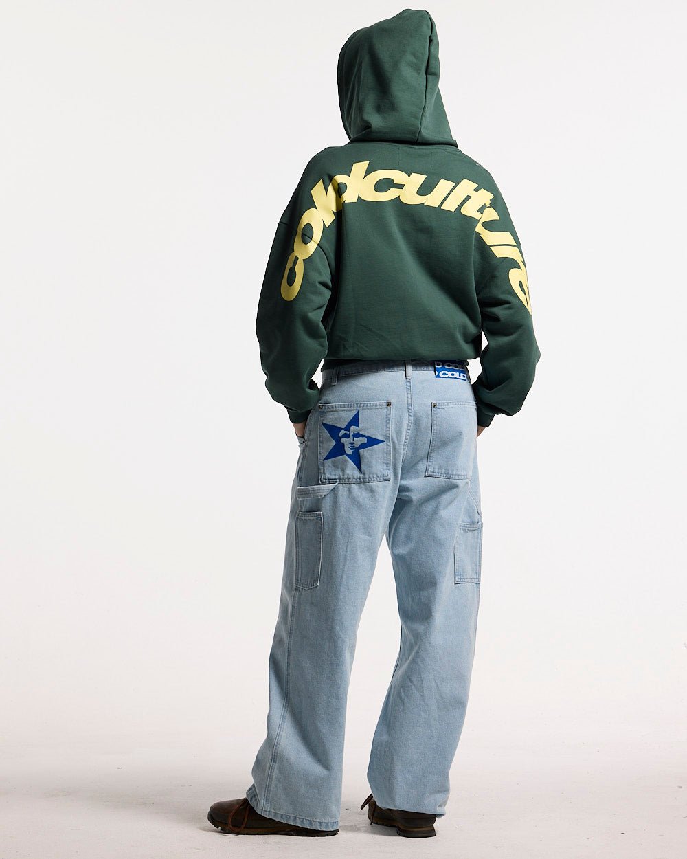 CURVED HOODIE JUNGLE GREEN - green oversized hoodie, back view on male model - Cold Culture