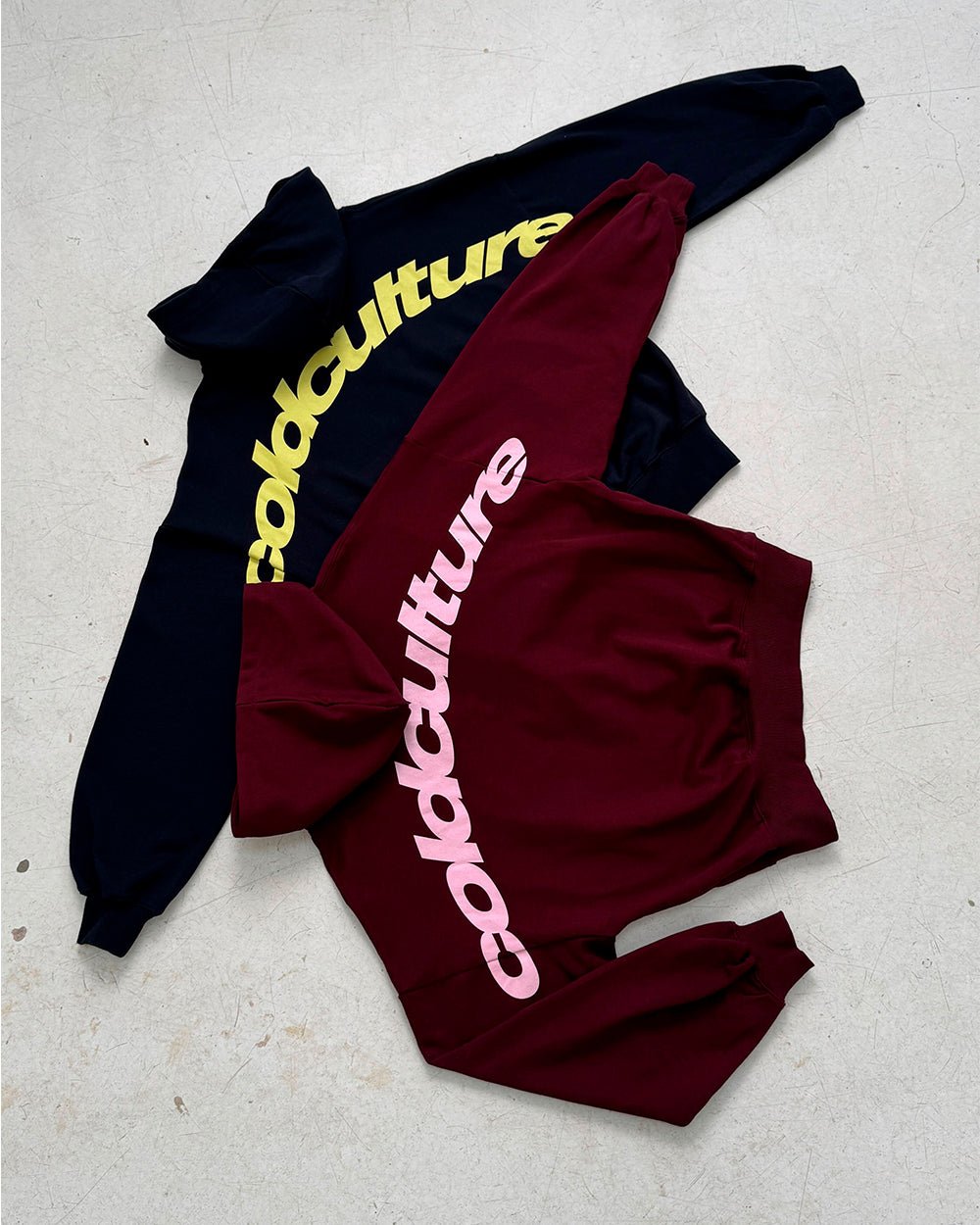 CURVED HOODIE WINE RED - wine red oversized hoodie, flat lay with matching pieces - Cold Culture