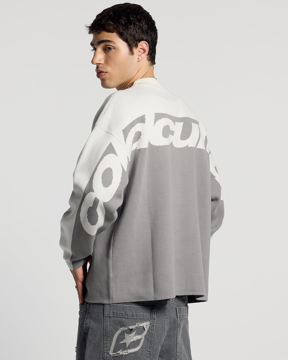 CURVED KNIT GREY & WHITE - grey and white knit sweater, back view on male model - Cold Culture #man