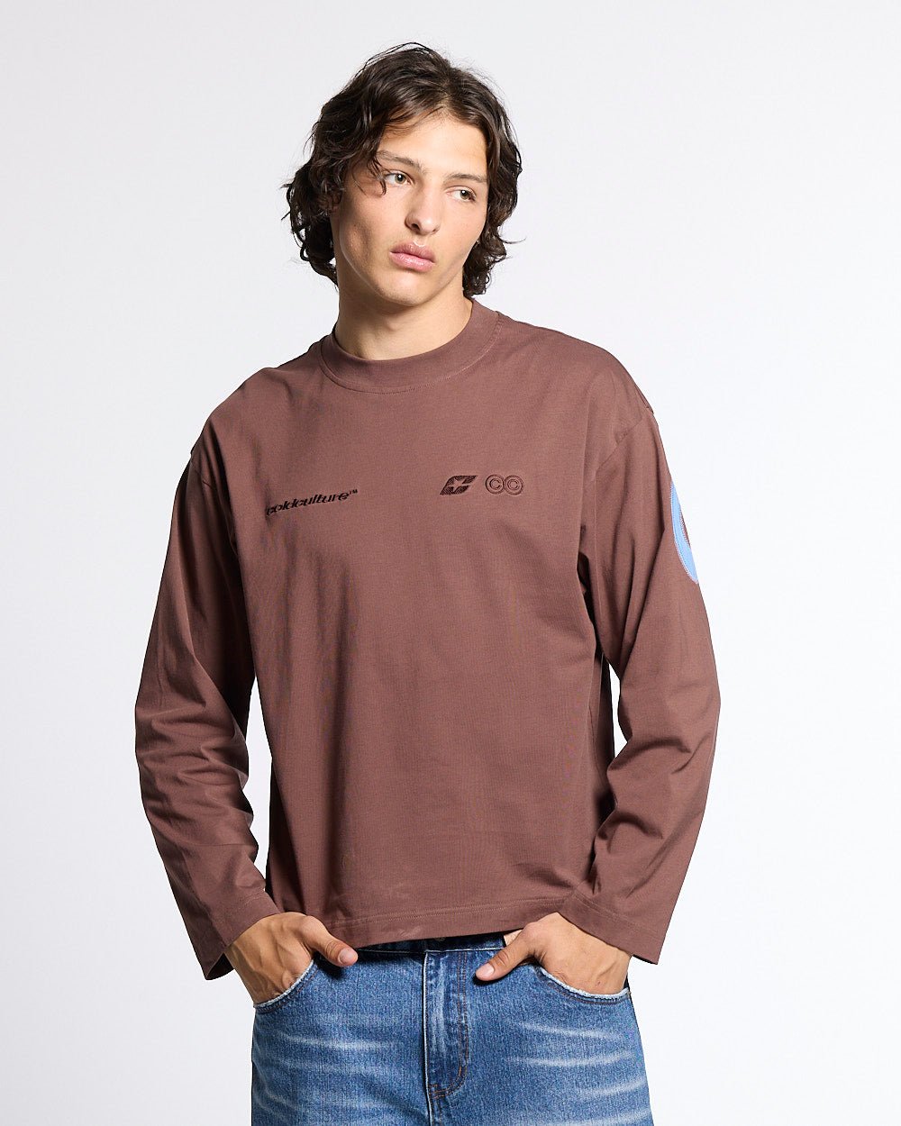 CURVED KNOTS LONGSLEEVE BROWN - brown logo print longsleeve tee, front view on male model - Cold Culture #man