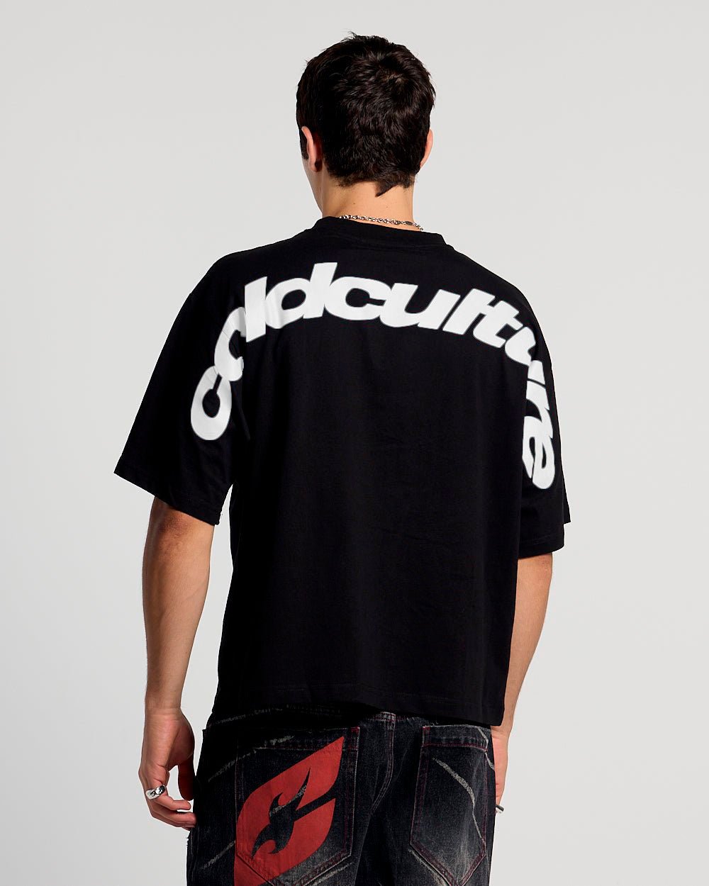 CURVED TEE BLACK & WHITE - black graphic print tee, back view on male model - Cold Culture #man