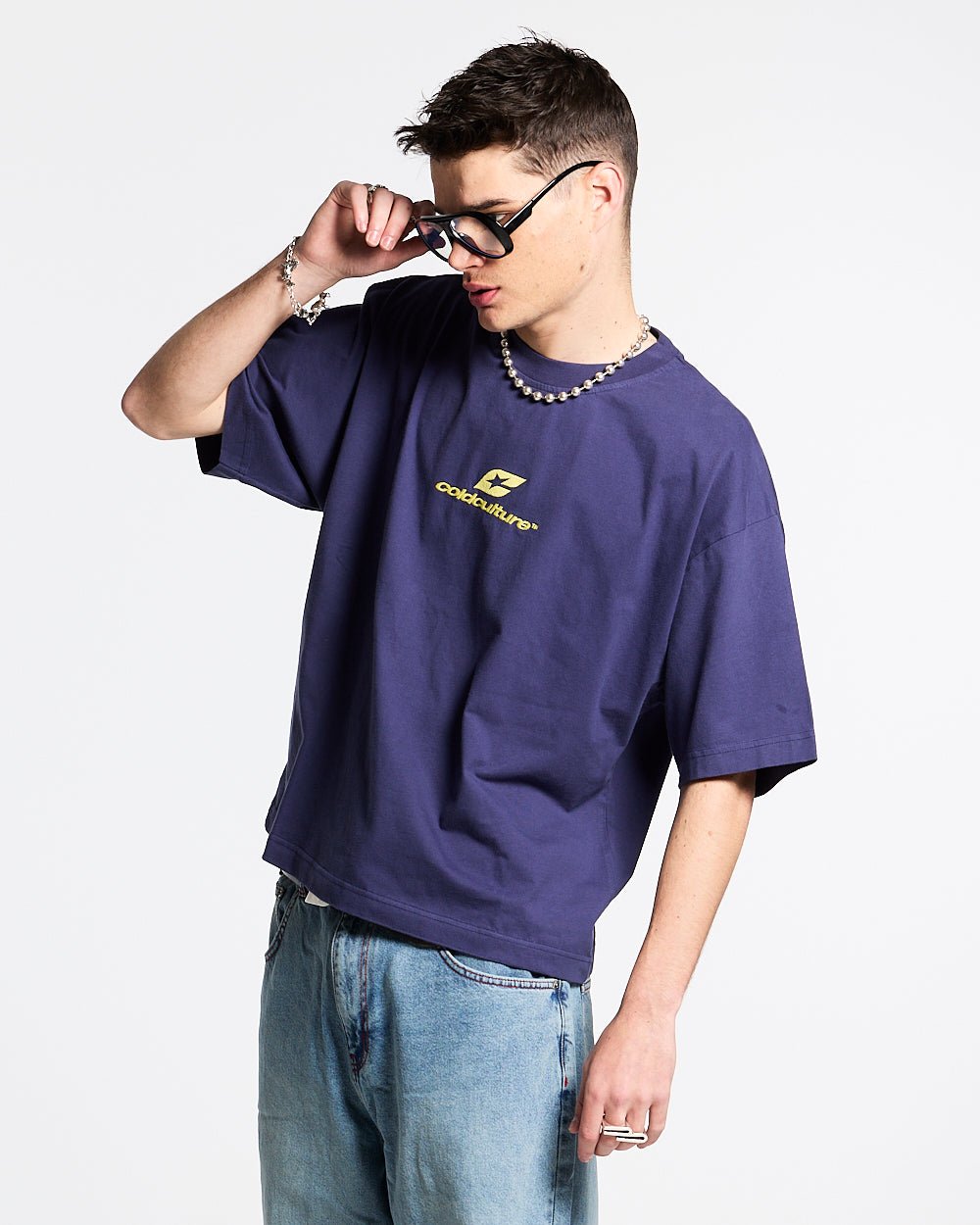 CURVED TEE ECLIPSE - navy blue oversized tee, front view on male model - Cold Culture #man