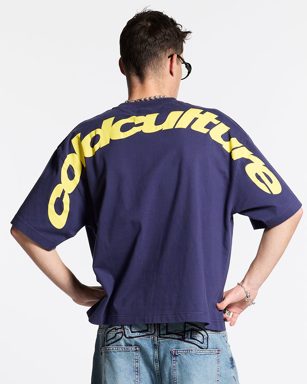 CURVED TEE ECLIPSE - navy blue oversized tee, back view on male model - Cold Culture #man