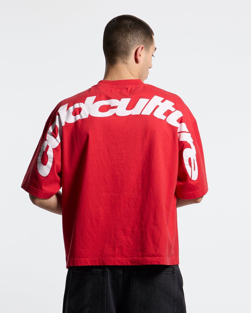 CURVED TEE RACING RED - red oversized tee, back view on male model - Cold Culture #man
