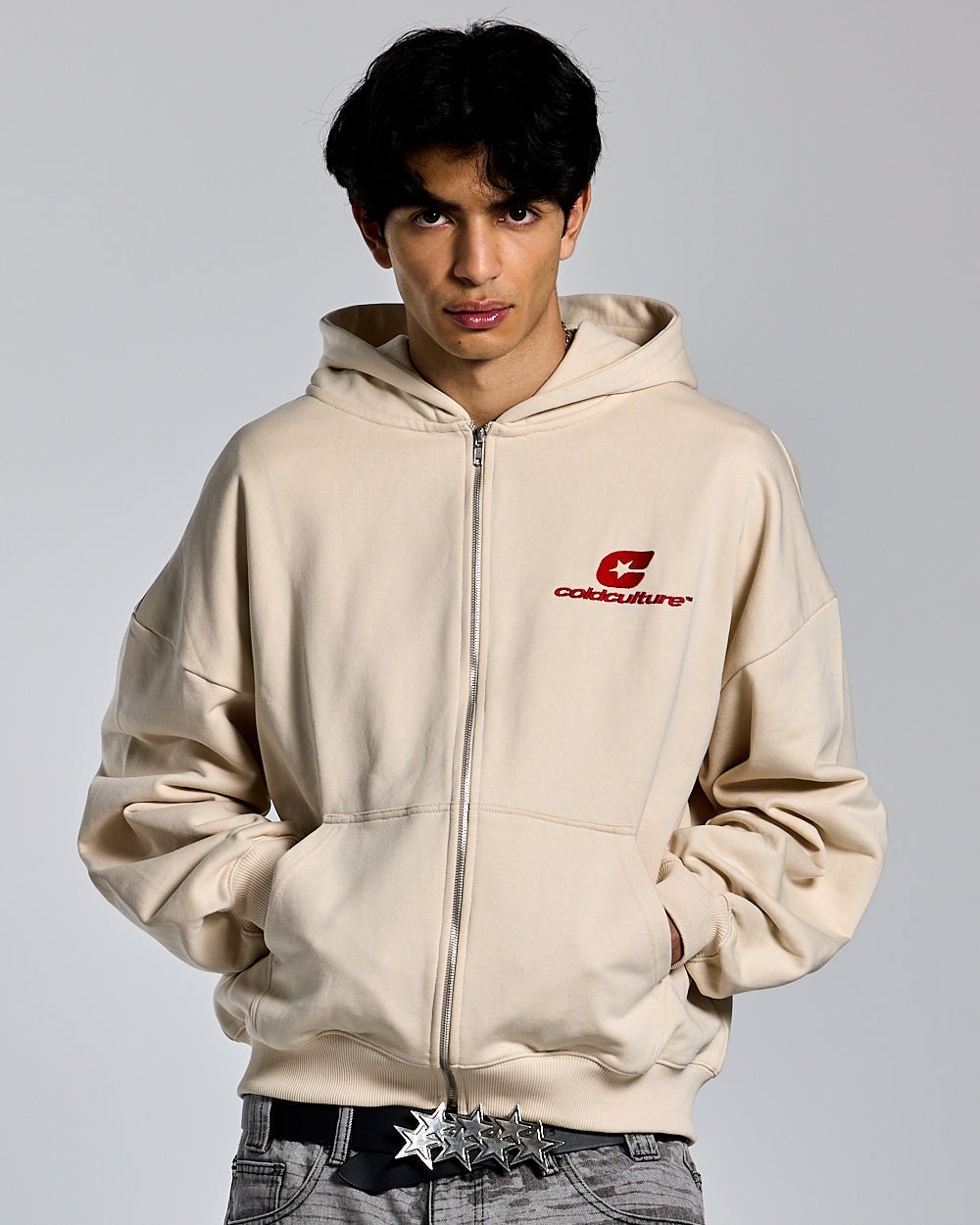CURVED ZIP HOODIE CREAM - cream logo print zip hoodie, front view on male model - Cold Culture #man