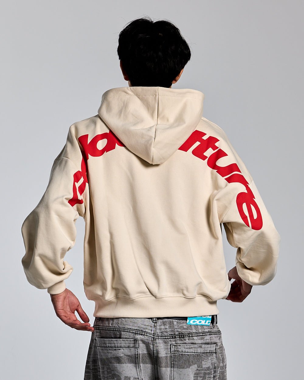 CURVED ZIP HOODIE CREAM - cream logo print zip hoodie, back view on male model - Cold Culture #man