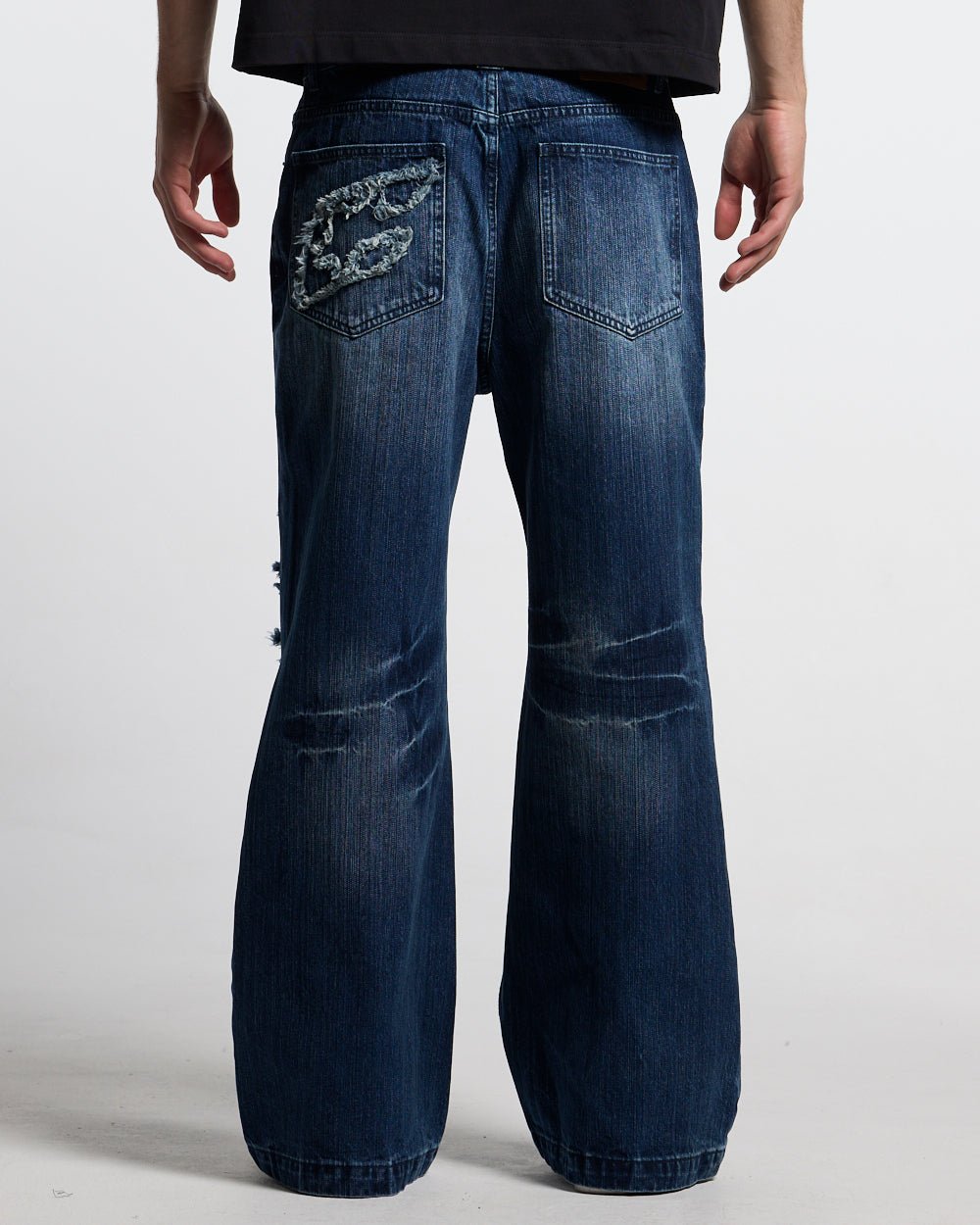 D-STRESSED V3 PANTS WASHED DENIM - distressed washed denim pants, back view on male model - Cold Culture