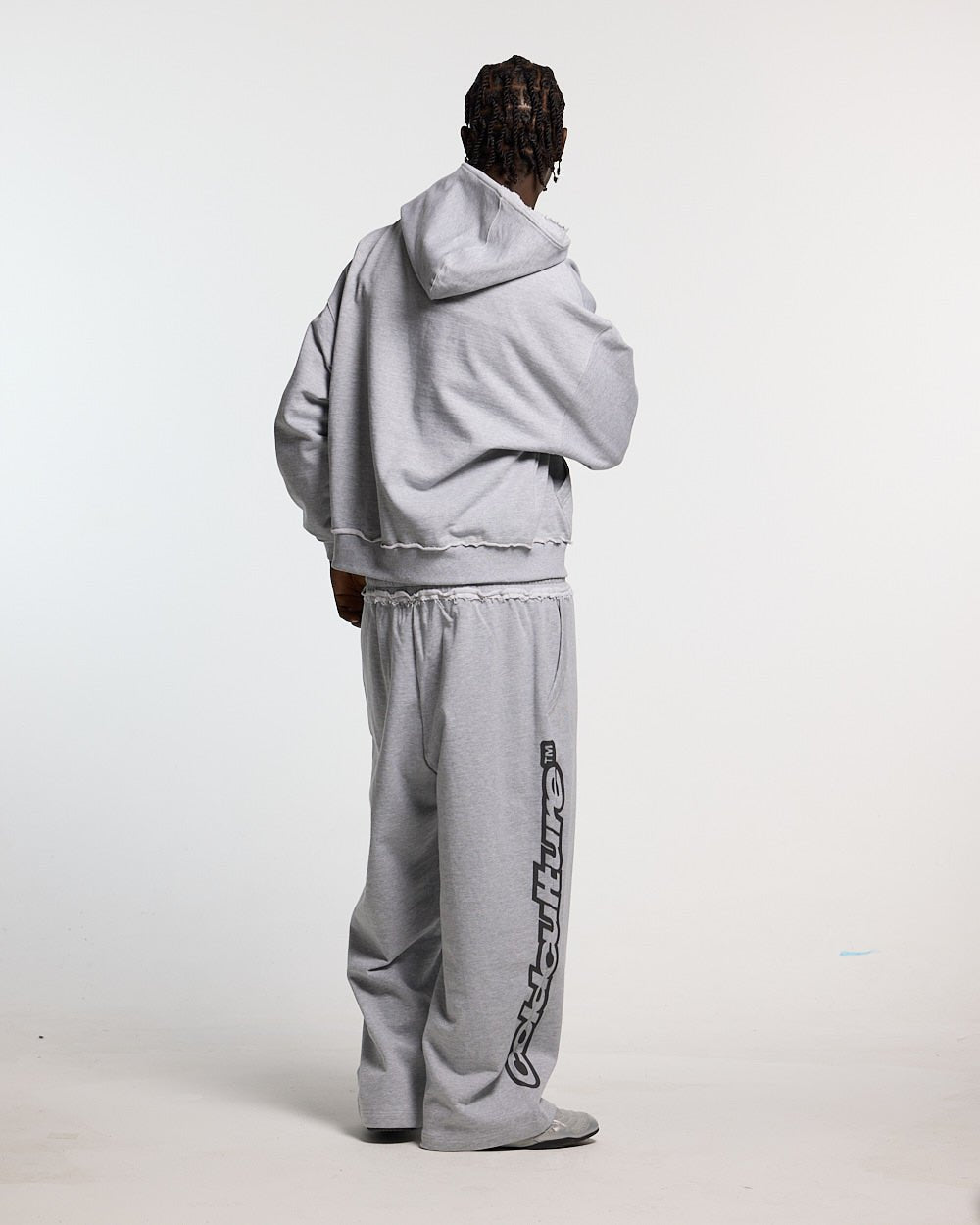DAILY SET SWEATPANT GREY MELANGE - grey melange sweatpants, back view on male model - Cold Culture