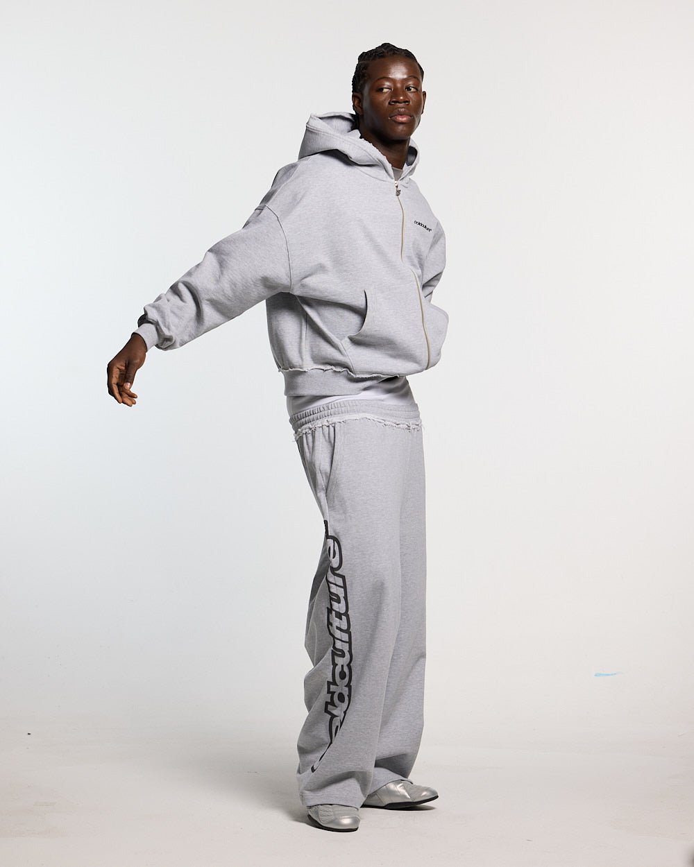 DAILY SET SWEATPANT GREY MELANGE - grey melange sweatpants, front view on male model - Cold Culture #man