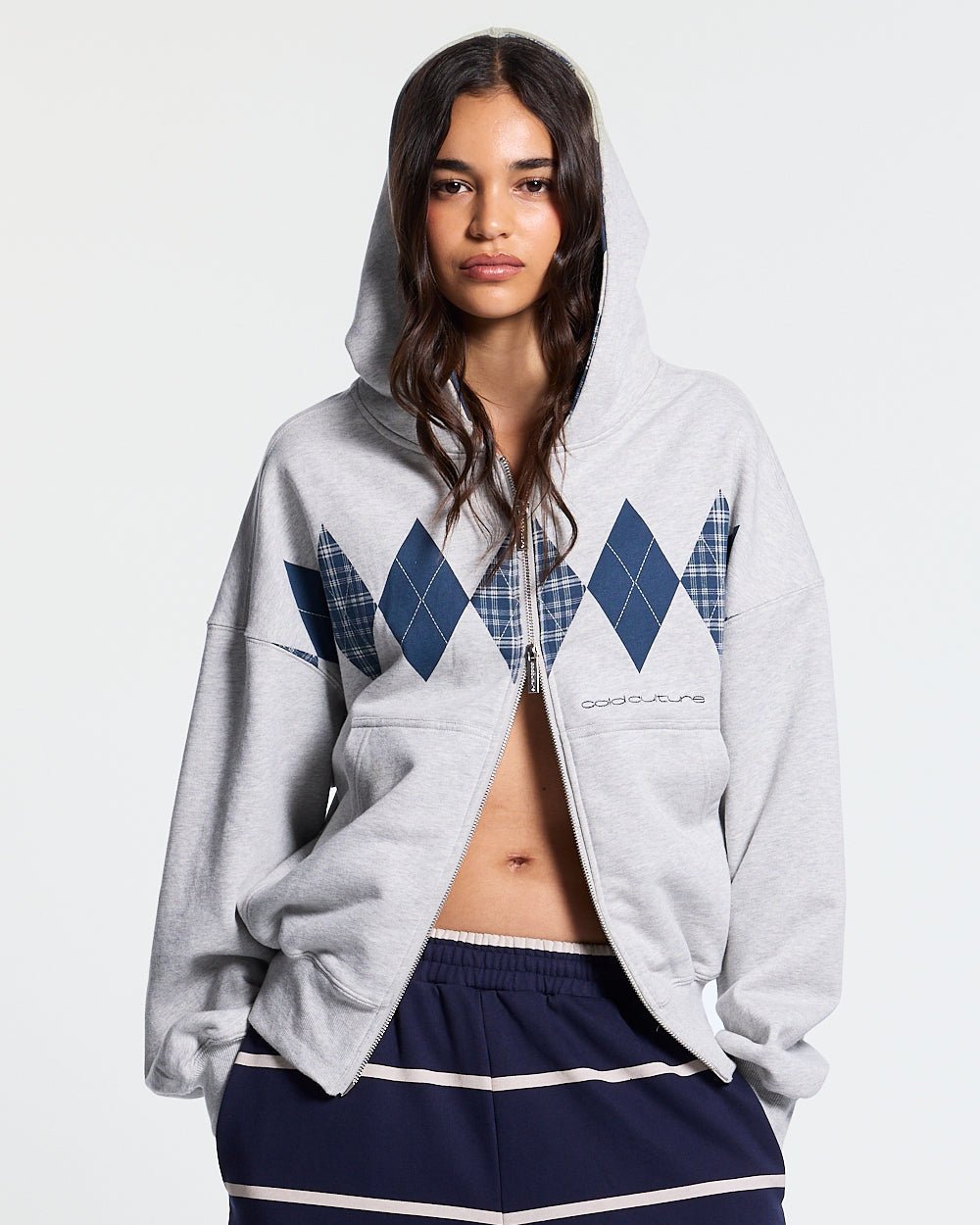 DECADE ZIP HOODIE HEATHER GREY - heather grey argyle zip hoodie, front view on female model - Cold Culture #woman