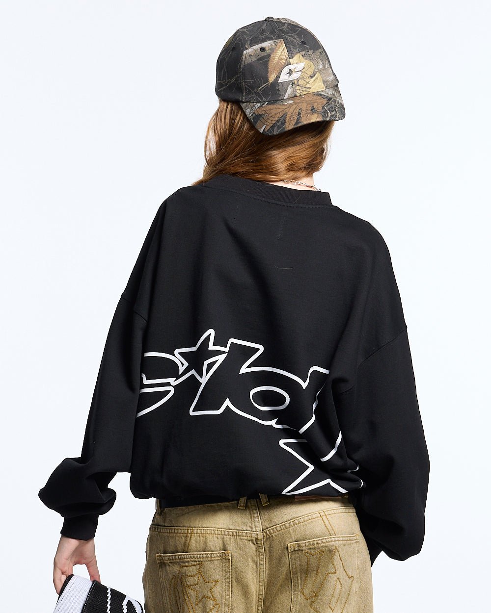 DEFENSE CREWNECK BLACK - black oversized crewneck sweatshirt, back view on female model - Cold Culture #woman