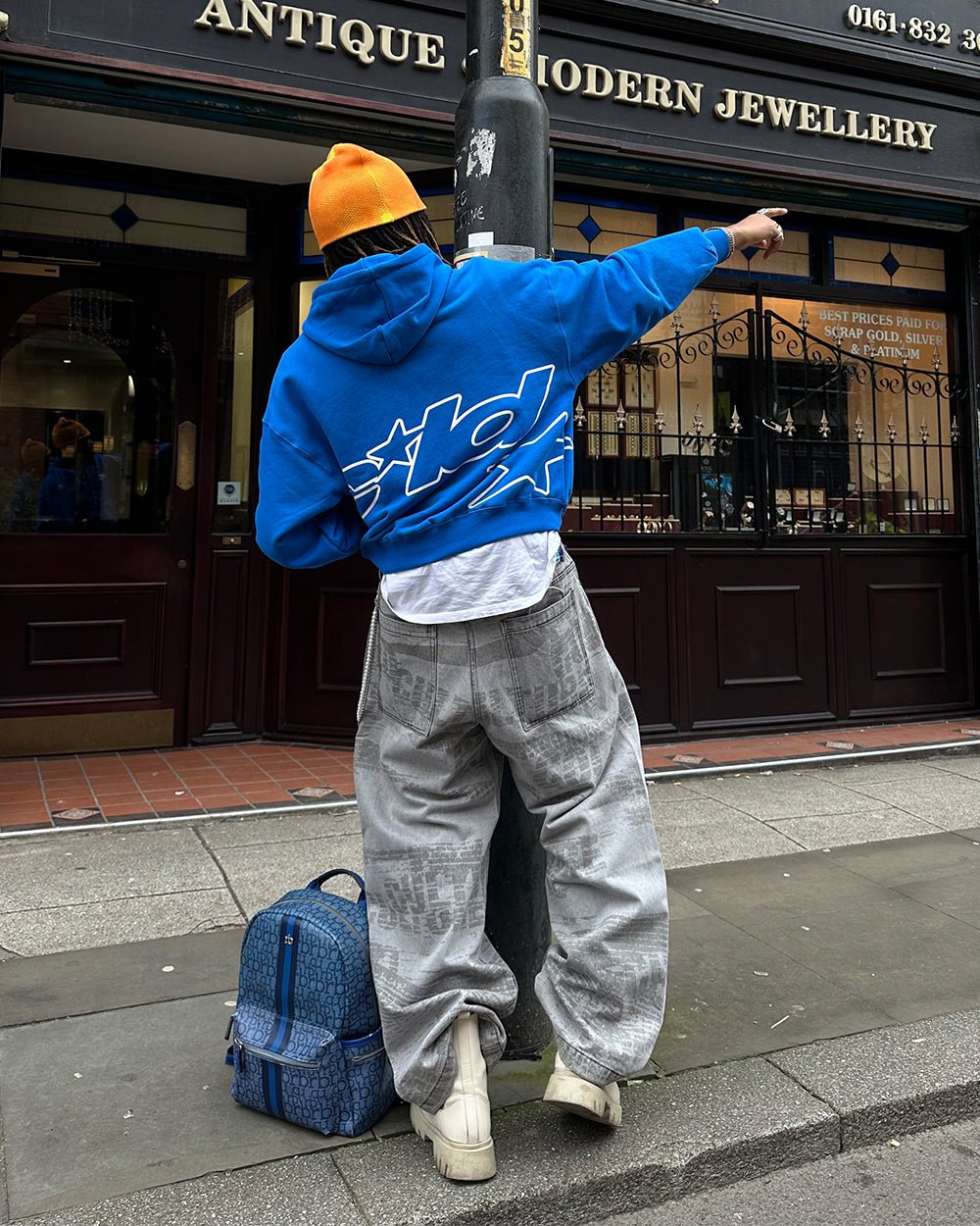DEFENSE HOODIE ELECTRIC BLUE - royal blue graphic print hoodie, street style shot - Cold Culture